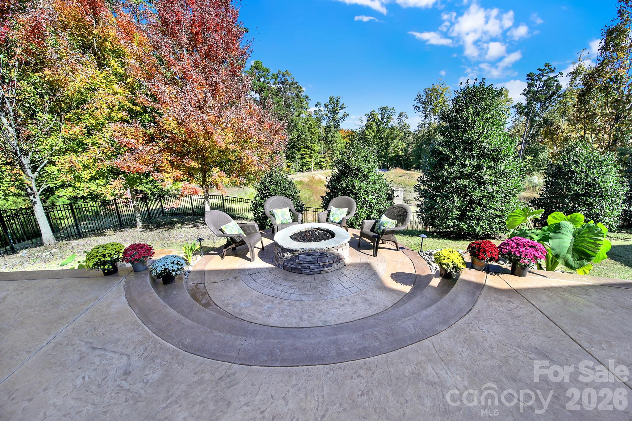 989 Emory Lane Fort Mill, SC 29708 - Photo 40 of 48 a view of a table and chairs in a patio