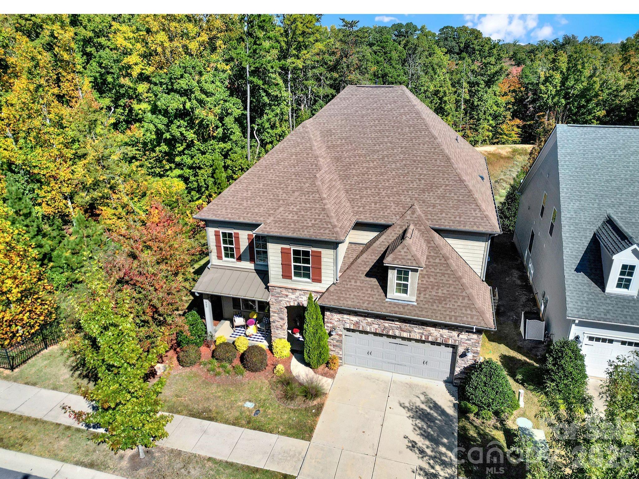 989 Emory Lane Fort Mill, SC 29708 - Photo 45 of 48 an aerial view of a house with swimming pool and sitting area