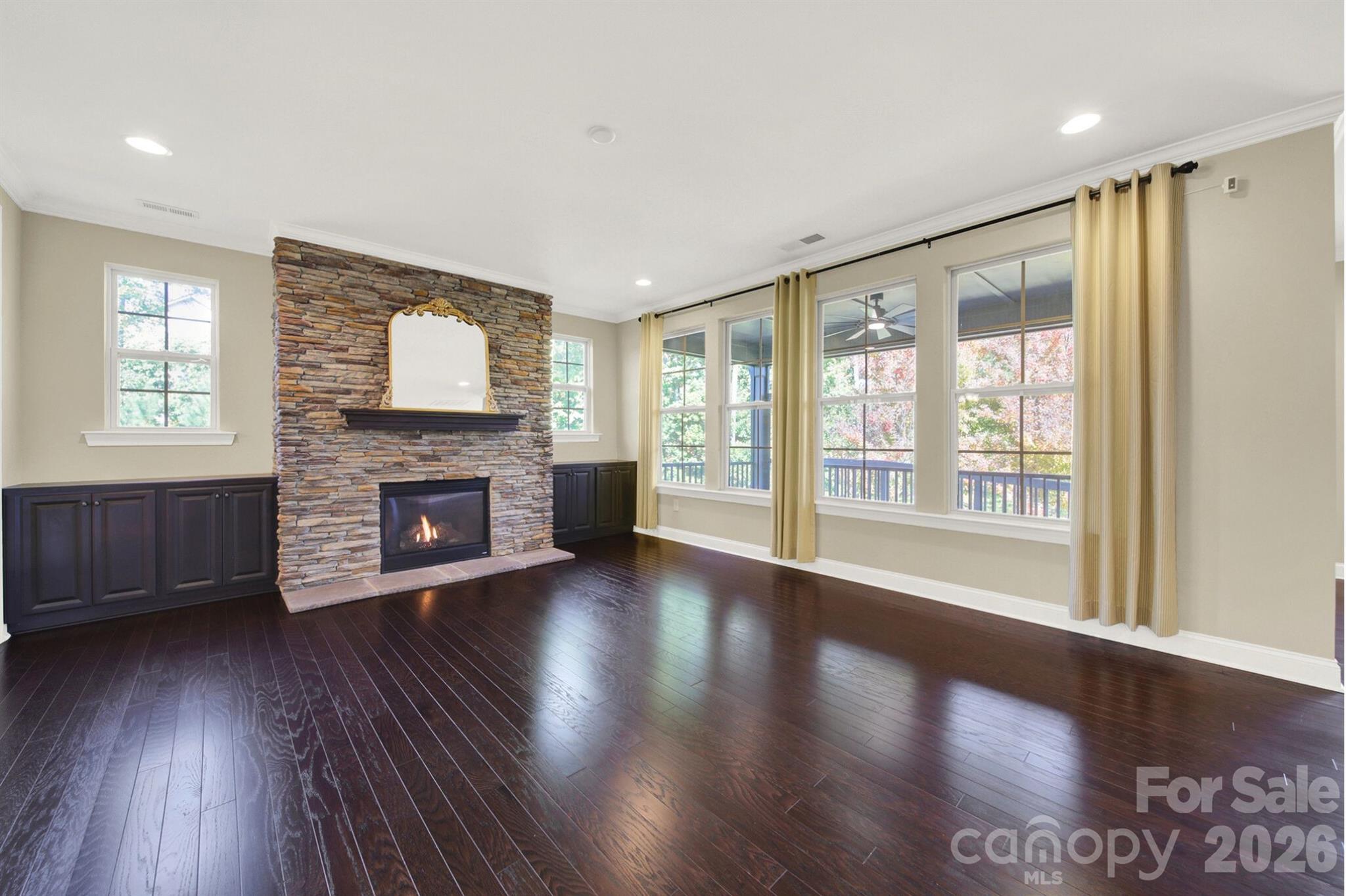 989 Emory Lane Fort Mill, SC 29708 - Photo 6 of 48 a living room with furniture wooden floor and a fireplace