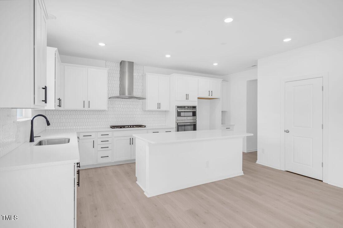 921 Kinglet House Road Knightdale, NC 27545 - Photo 4 of 33 silverstone-bedford-lot-371-kitchen-01