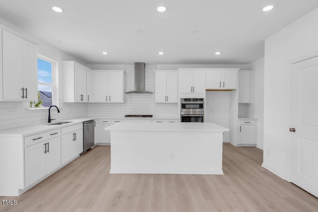 921 Kinglet House Road Knightdale, NC 27545 - Photo 6 of 33 silverstone-bedford-lot-371-kitchen-03