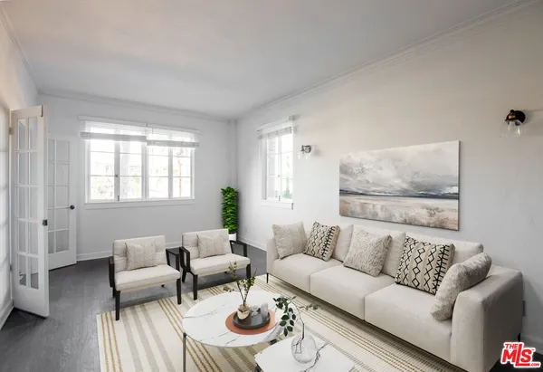 a living room with furniture and a couch