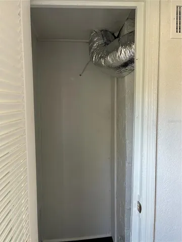 a view of balcony with wooden floor