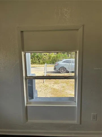 a bathroom with a sink toilet and a mirror