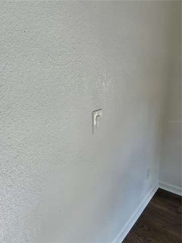 a bathroom with a toilet a sink and bathtub