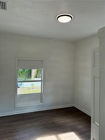 a view of an empty walk in closet