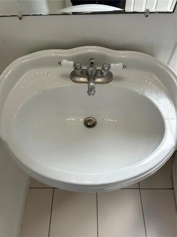 a kitchen with a sink and a stove