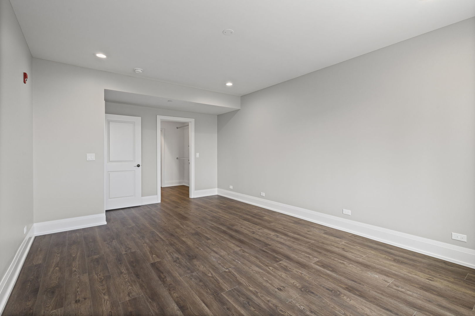 1036 Lake Street, Unit 4S Oak Park, IL 60301 - Photo 16 of 29 a view of an empty room with wooden floor and closet