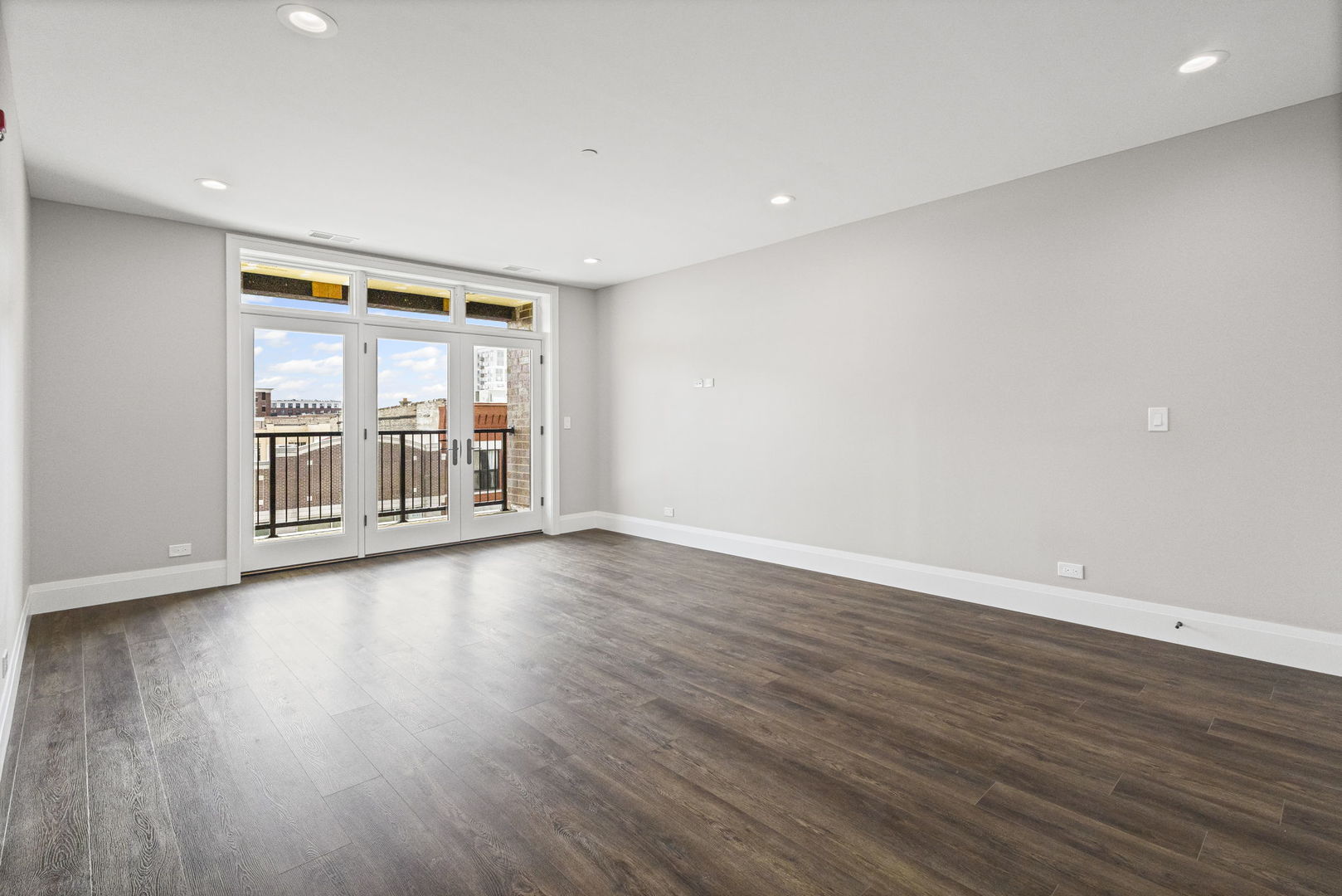 1036 Lake Street, Unit 4S Oak Park, IL 60301 - Photo 4 of 29 a view of a room with wooden floor and window