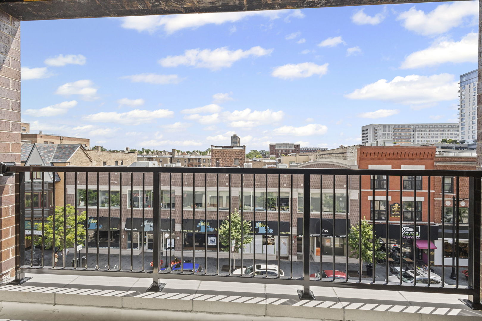 1036 Lake Street, Unit 4S Oak Park, IL 60301 - Photo 6 of 29 a view of a city from a balcony