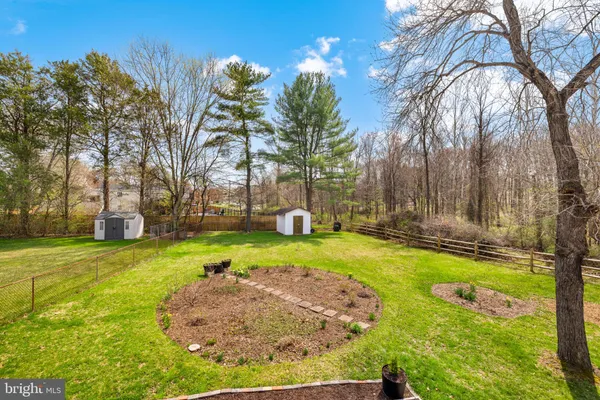 a swimming pool with wooden fence