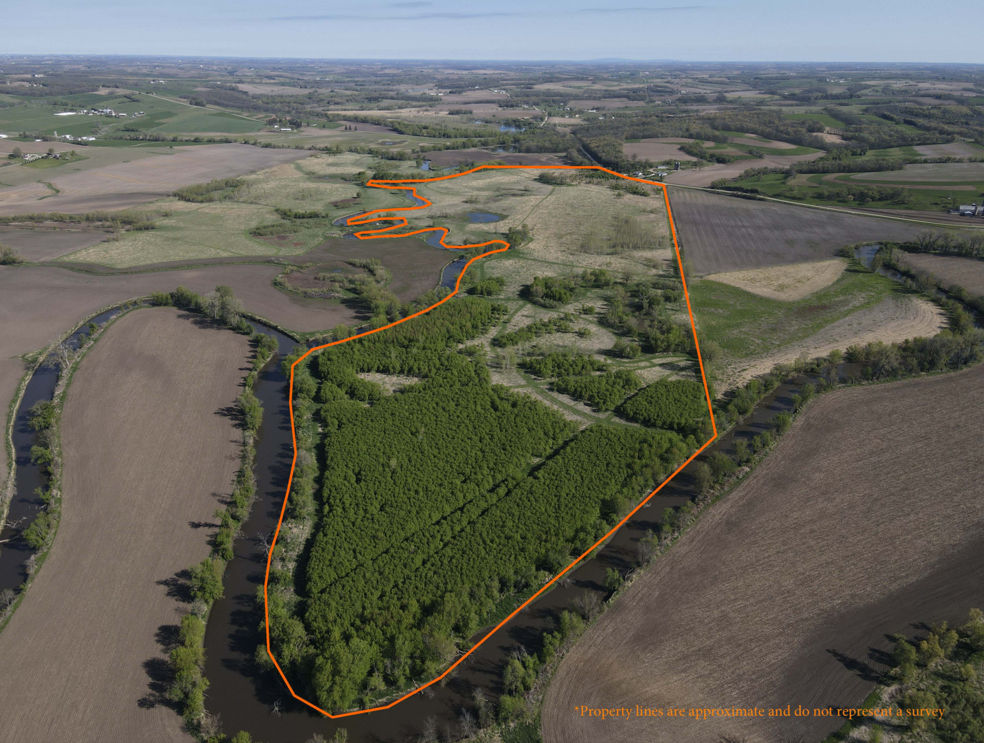 0 County Rd M Road Browntown, WI 53522 - Photo 2 of 59 an aerial view of a residential houses with outdoor space and trees