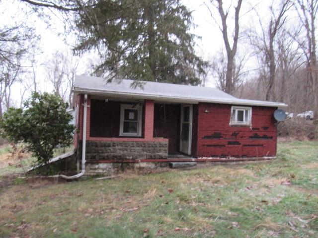 358 Ferguson Road Dunbar, PA 15431 - Photo 20 of 32 a front view of a house with garden