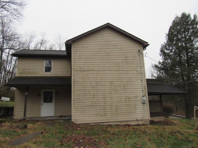 358 Ferguson Road Dunbar, PA 15431 - Photo 2 of 32 a front view of a house with garage