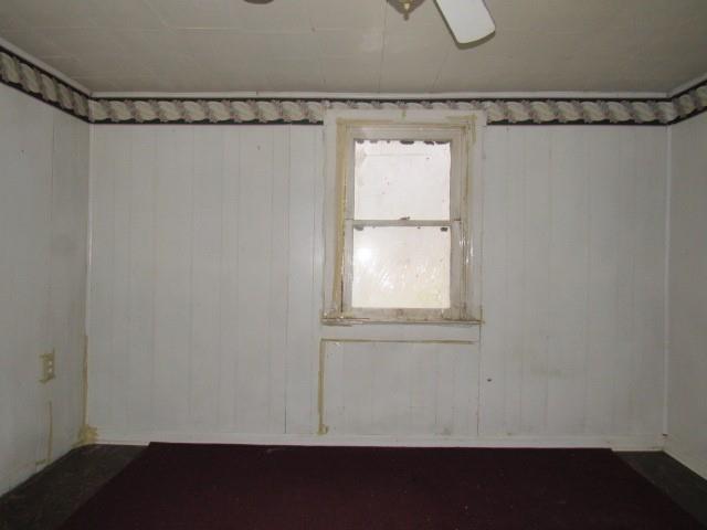 358 Ferguson Road Dunbar, PA 15431 - Photo 27 of 32 a view of a room with rack on the wall and a window