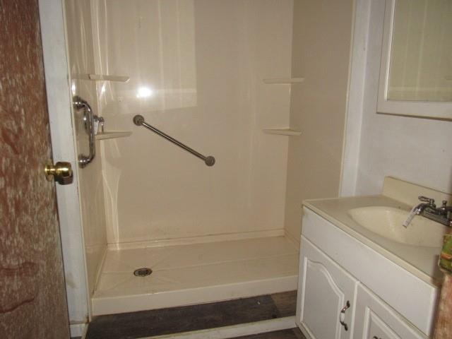 358 Ferguson Road Dunbar, PA 15431 - Photo 8 of 32 a bathroom with a sink a shower and vanity
