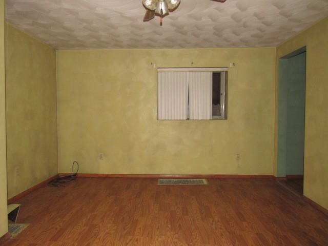358 Ferguson Road Dunbar, PA 15431 - Photo 10 of 32 an empty room with a wooden door