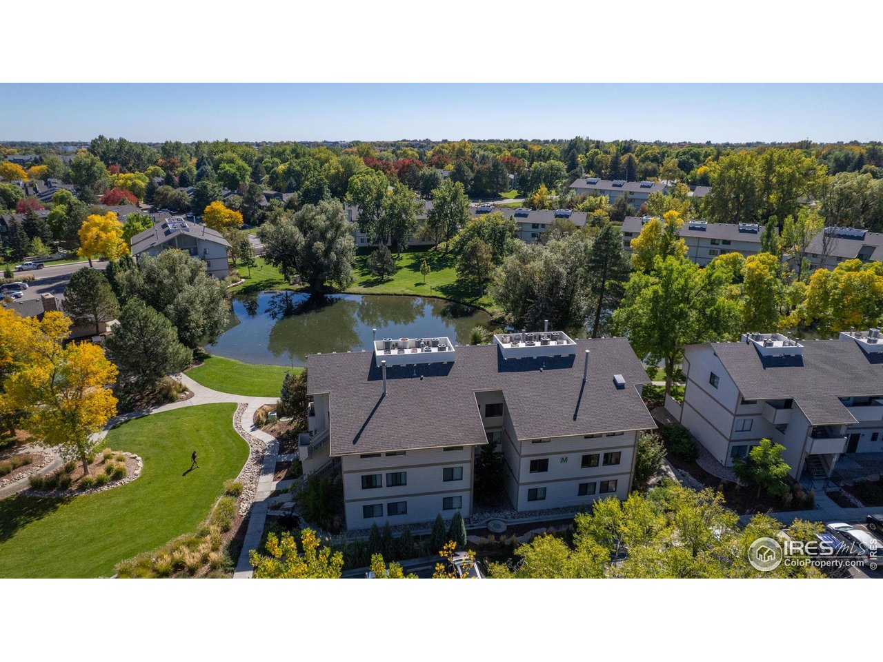 1705 Heatheridge Road, Unit 204 Fort Collins, CO 80526 - Photo 20 of 32 Building M is close to the Swimming Pool, Clubhouse, Laundromat & Mailboxes.