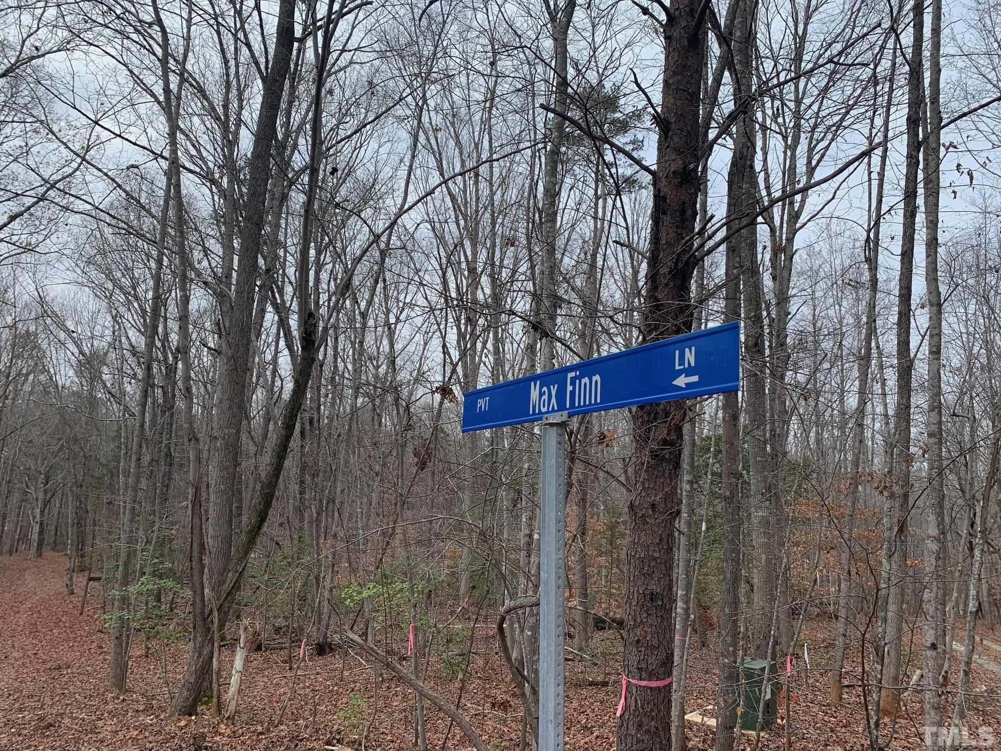 75 Max Finn Lane Roxboro, NC 27574 - Photo 11 of 11 a wooden fence with a trees in the background