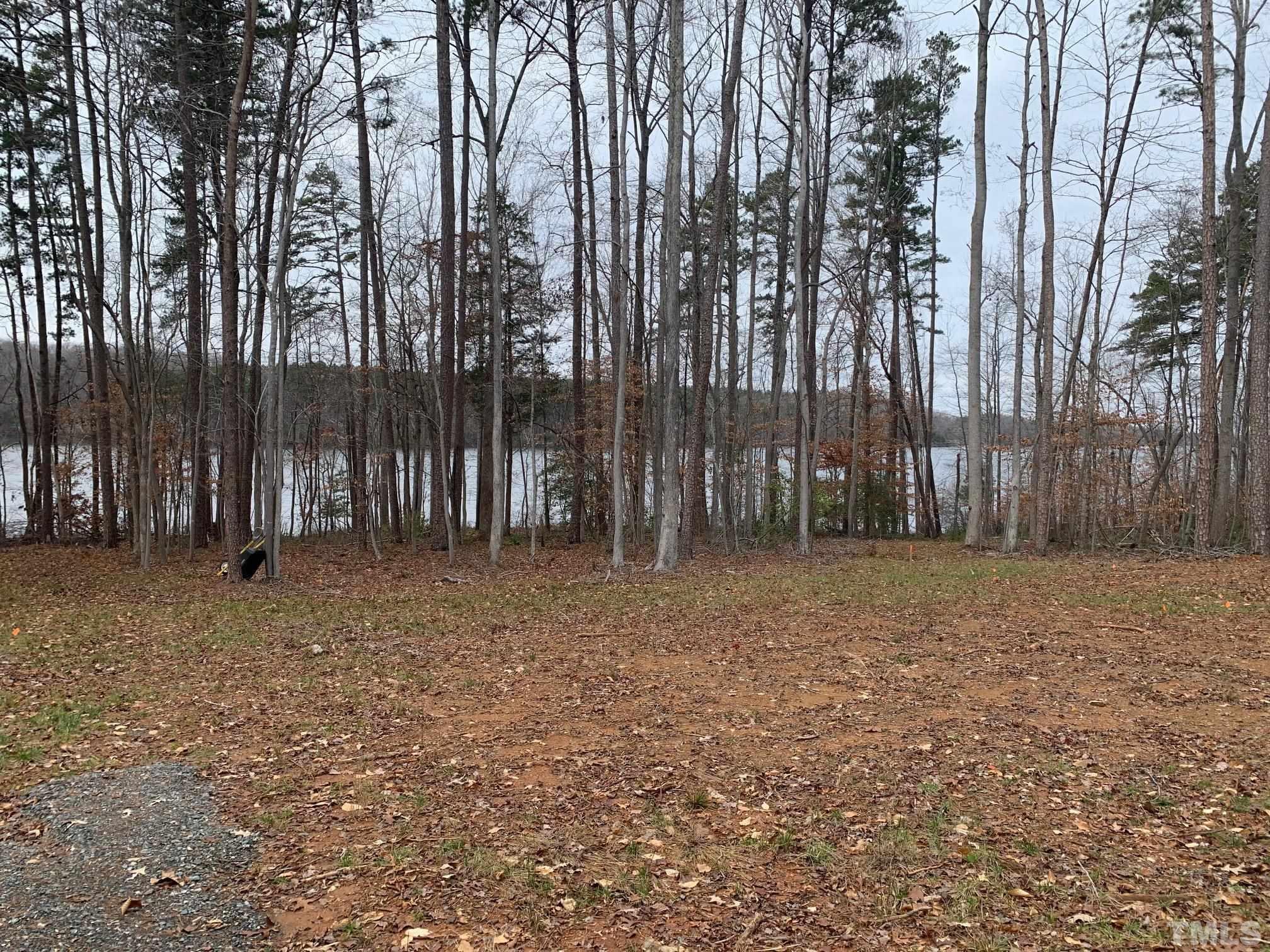 75 Max Finn Lane Roxboro, NC 27574 - Photo 4 of 11 a view of outdoor space with deck and tree
