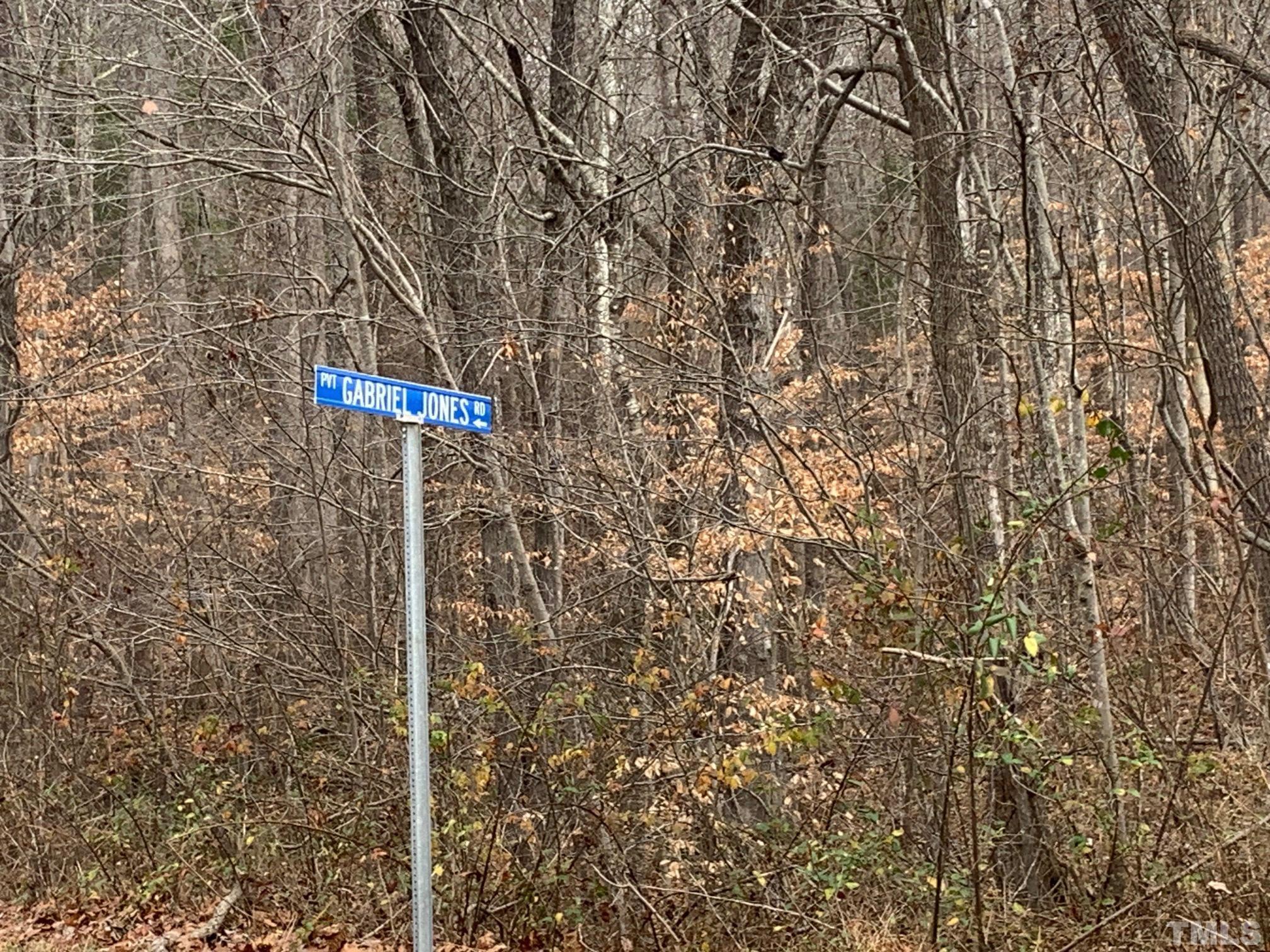 75 Max Finn Lane Roxboro, NC 27574 - Photo 10 of 11 a street sign on a pole