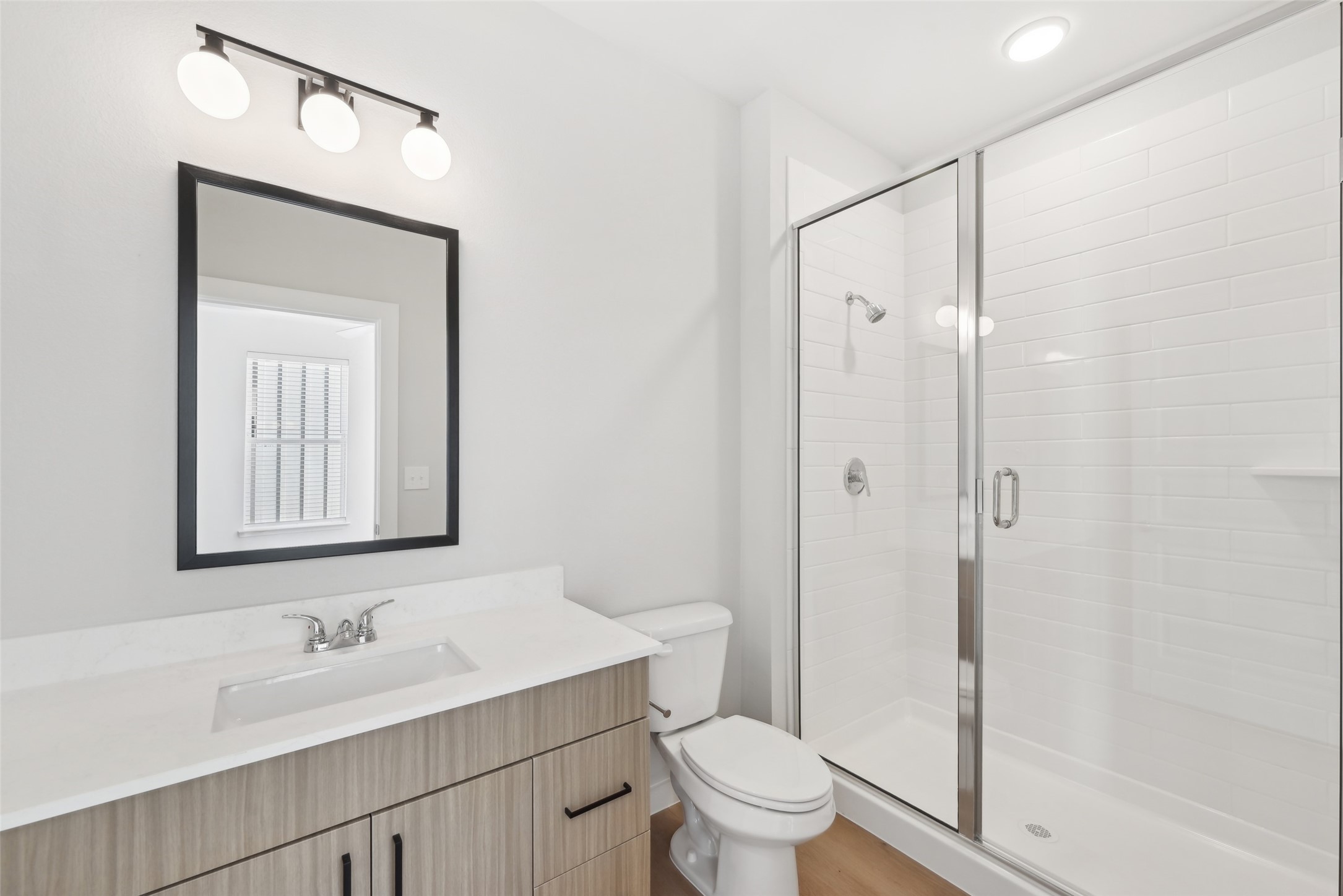 3651-413 South Custer Road McKinney, TX 75070 - Photo 16 of 31 a bathroom with a sink a toilet and shower