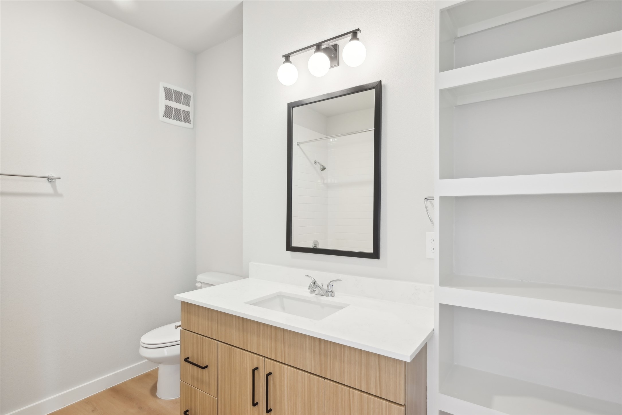 3651-413 South Custer Road McKinney, TX 75070 - Photo 23 of 31 a bathroom with a toilet sink and mirror