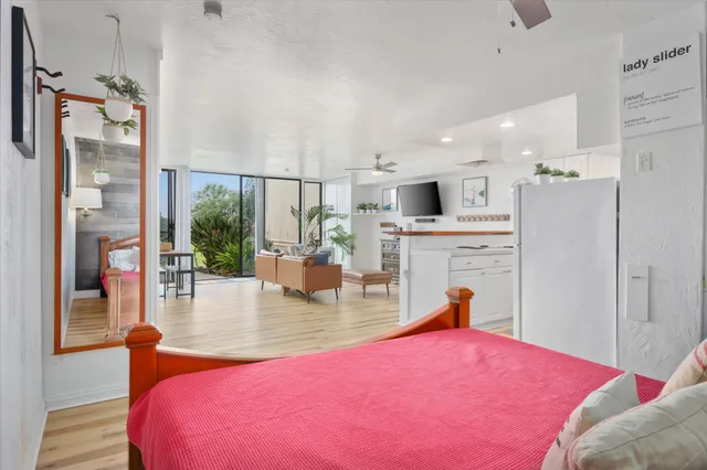 a bed room with a bed and a fireplace