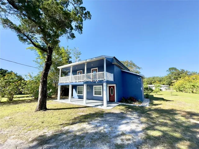 a house view with a outdoor space