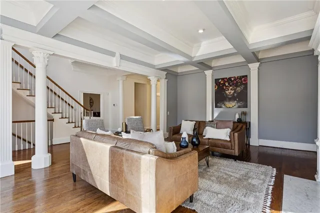 a living room with furniture and a table