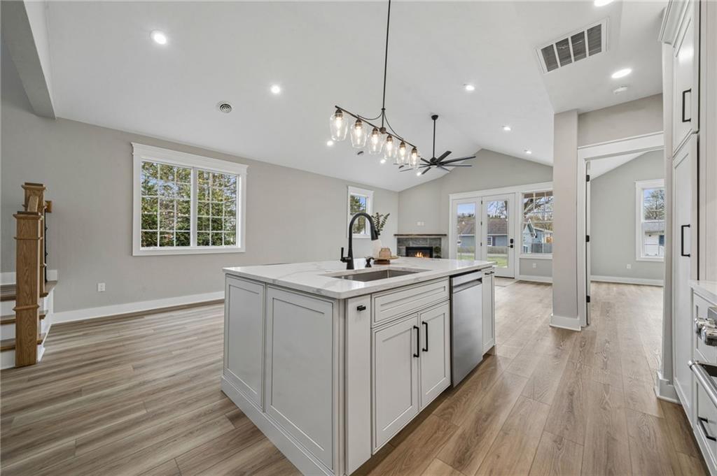 224 Bunger Street Ligonier, PA 15658 - Photo 19 of 50 a kitchen with a sink window and stainless steel appliances