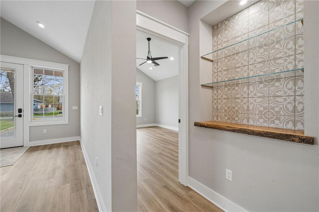 224 Bunger Street Ligonier, PA 15658 - Photo 25 of 50 a view of a hallway view with wooden floor and staircase