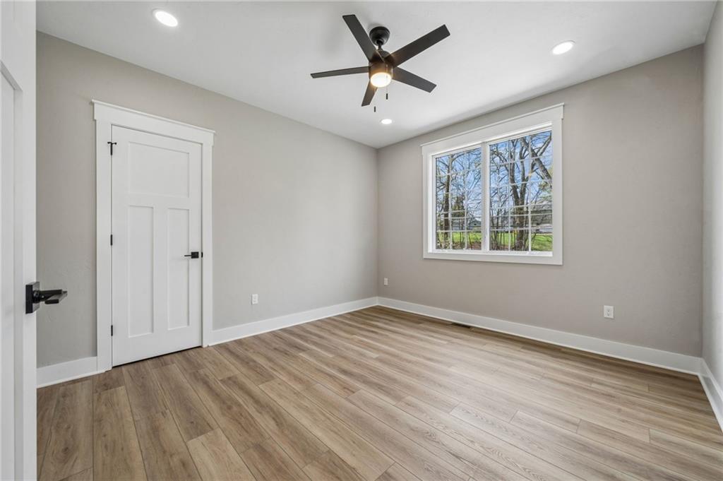 224 Bunger Street Ligonier, PA 15658 - Photo 35 of 50 a view of empty room with wooden floor and fan