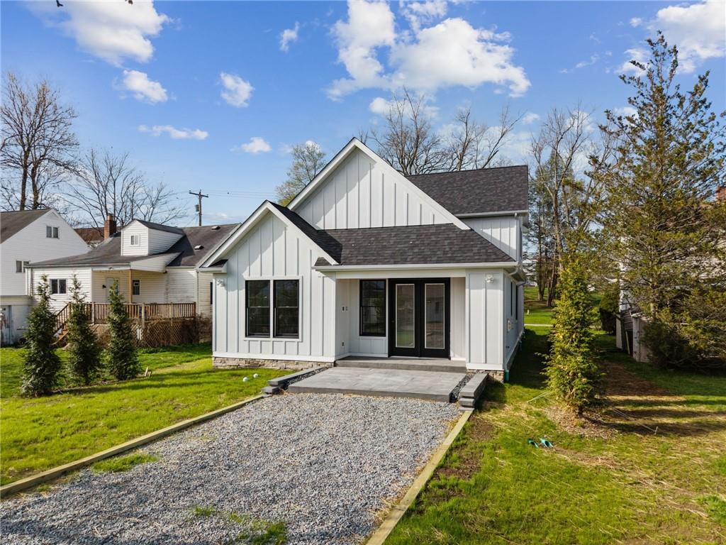 224 Bunger Street Ligonier, PA 15658 - Photo 42 of 50 a front view of a house with garden