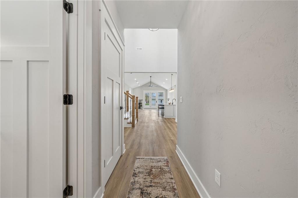 224 Bunger Street Ligonier, PA 15658 - Photo 10 of 50 a view of a hallway with wooden floor and staircase