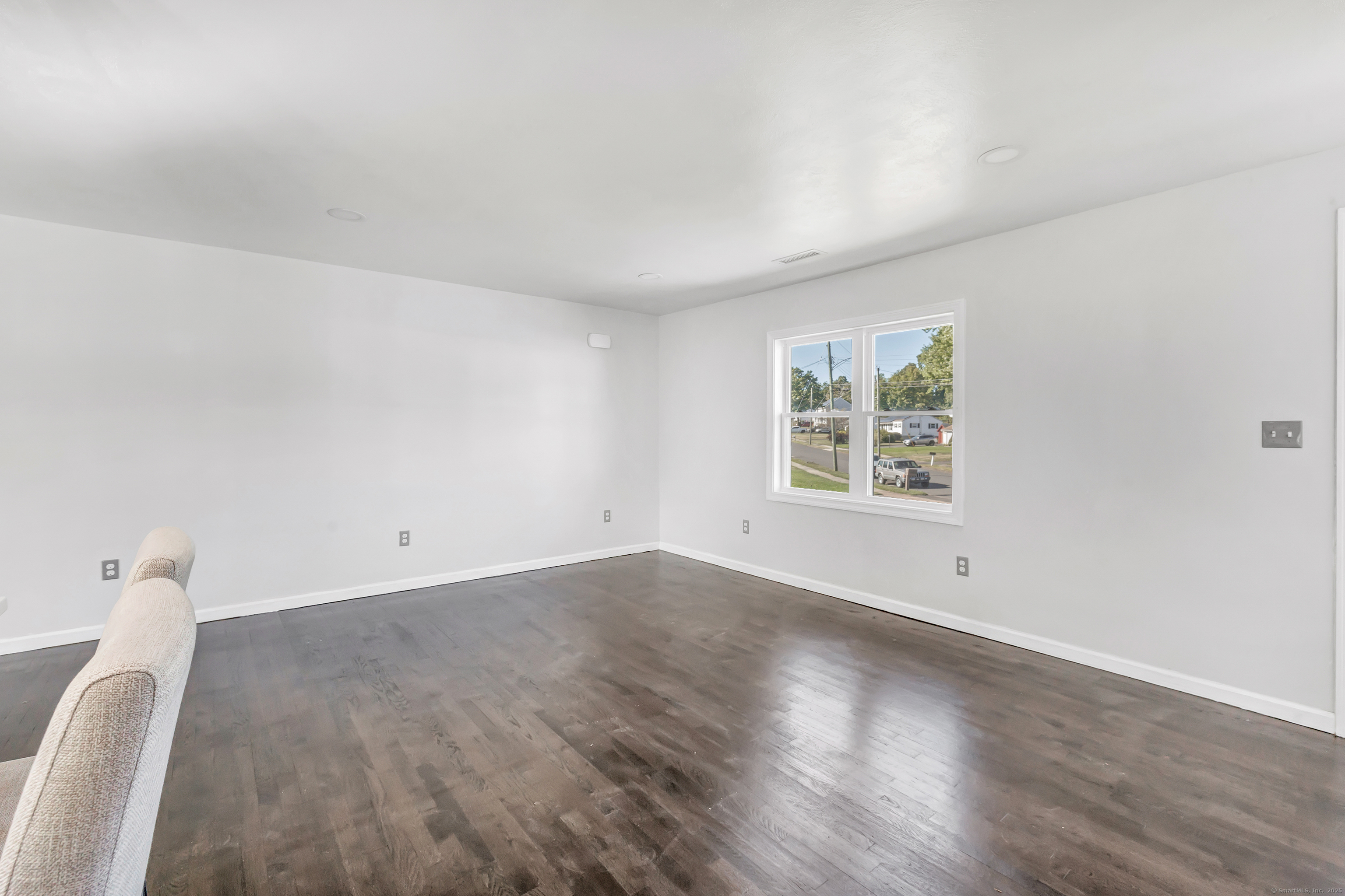 38 Pine River Road North Haven, CT 06473 - Photo 11 of 38 an empty room with wooden floor and window