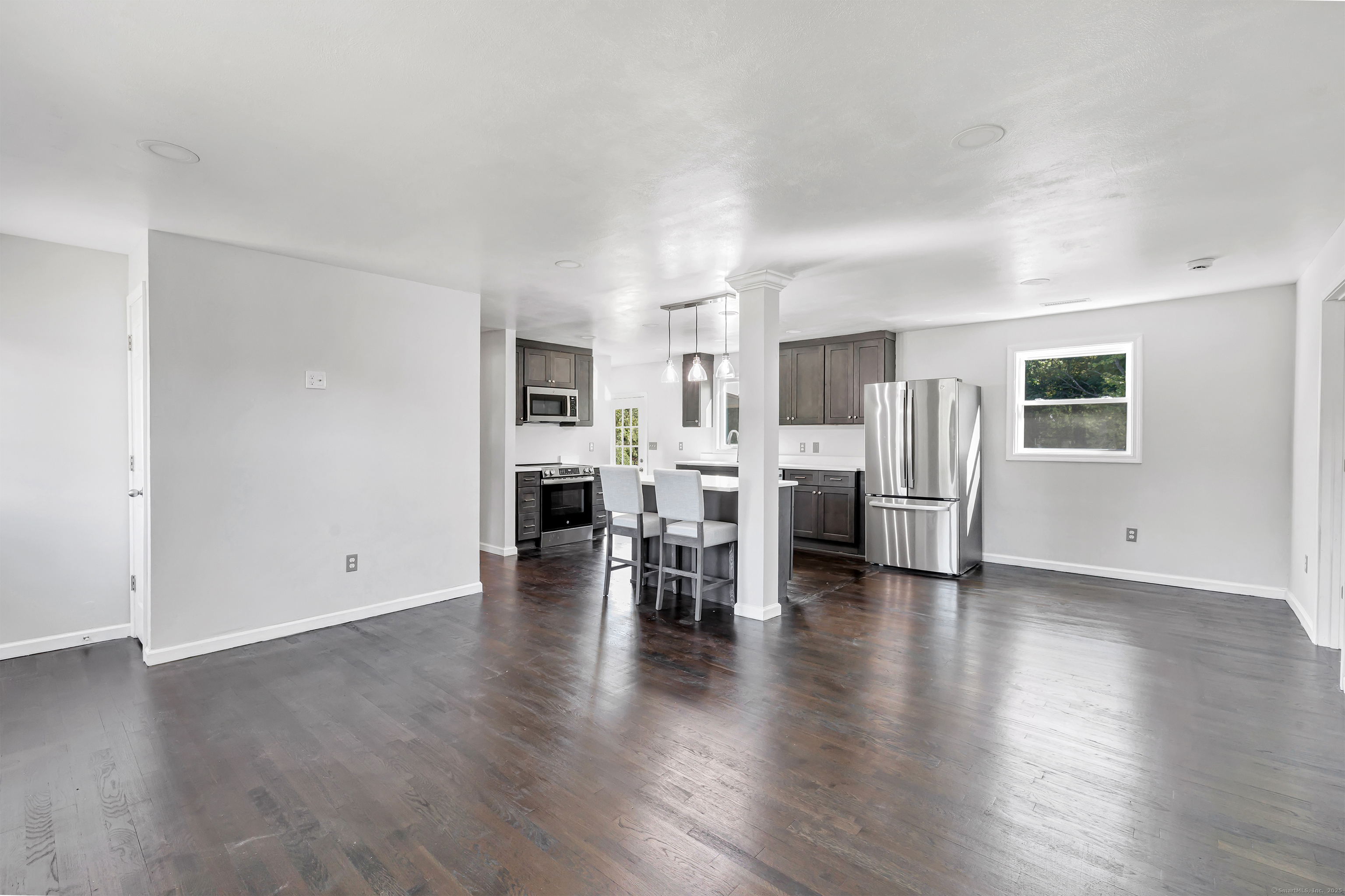 38 Pine River Road North Haven, CT 06473 - Photo 12 of 38 a view of livingroom with furniture and wooden floor