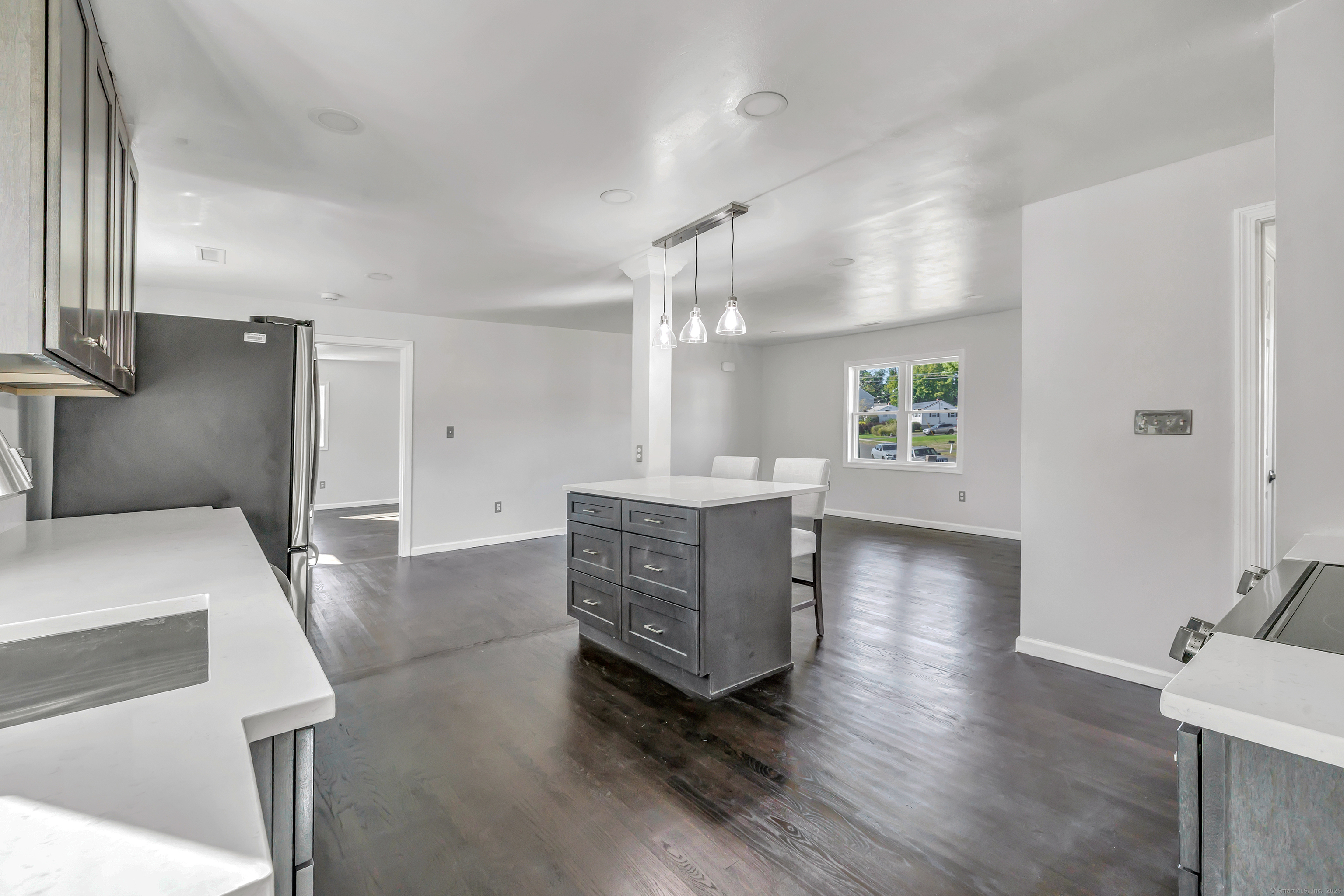 38 Pine River Road North Haven, CT 06473 - Photo 20 of 38 a room with a bed and a view of kitchen