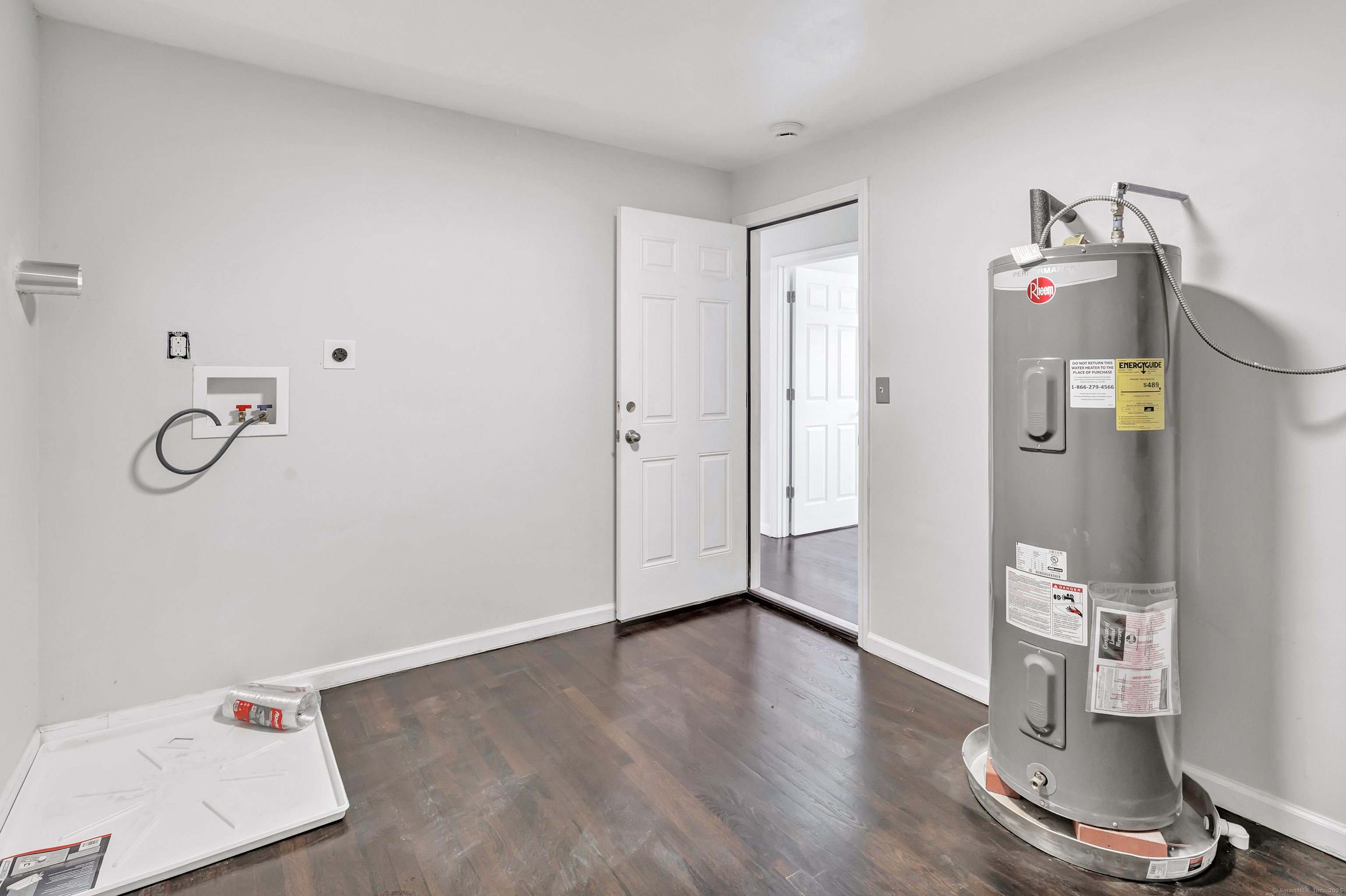 38 Pine River Road North Haven, CT 06473 - Photo 33 of 38 a view of empty room with wooden floor