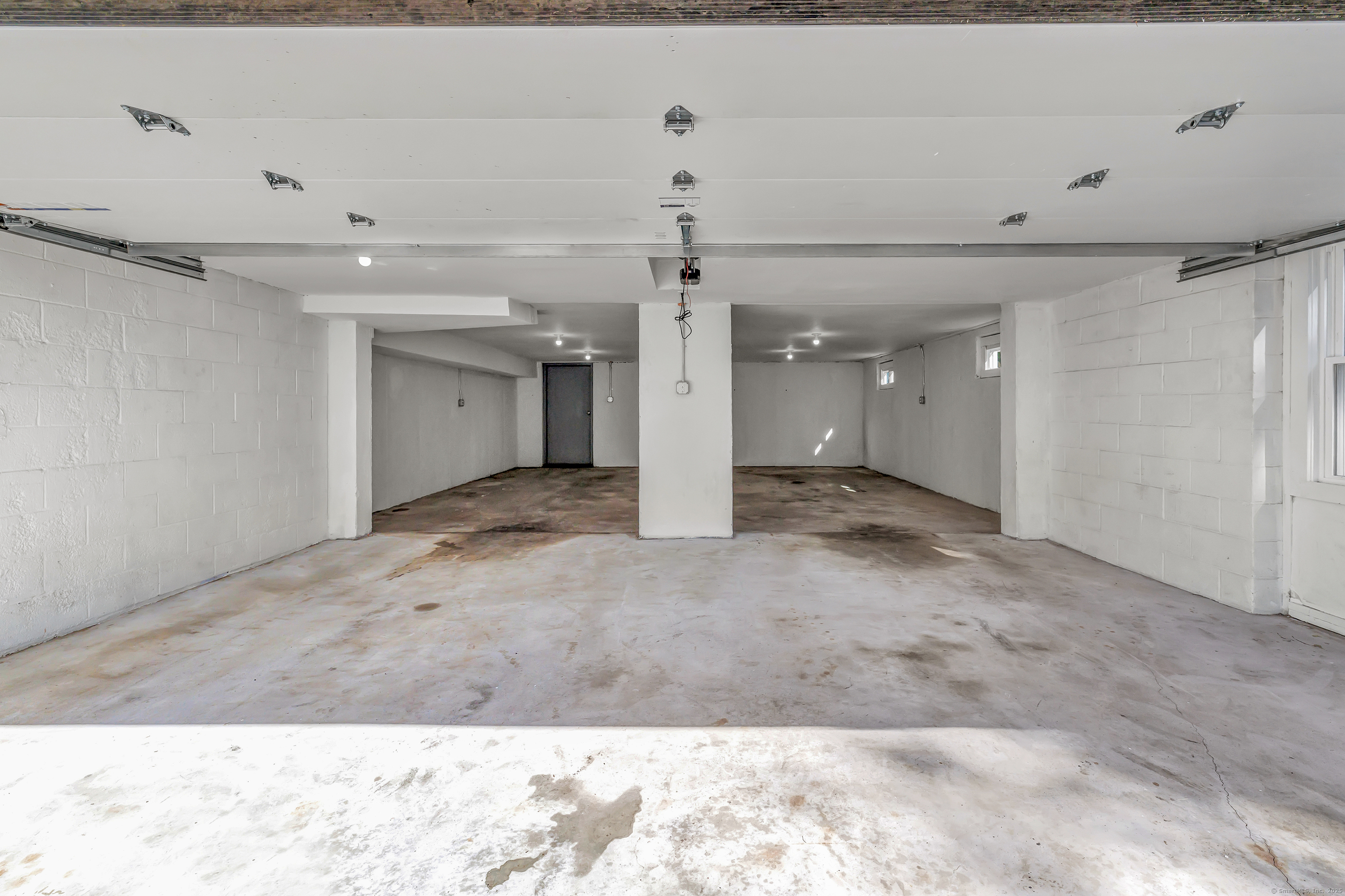 38 Pine River Road North Haven, CT 06473 - Photo 38 of 38 a view of a hallway with a chandelier