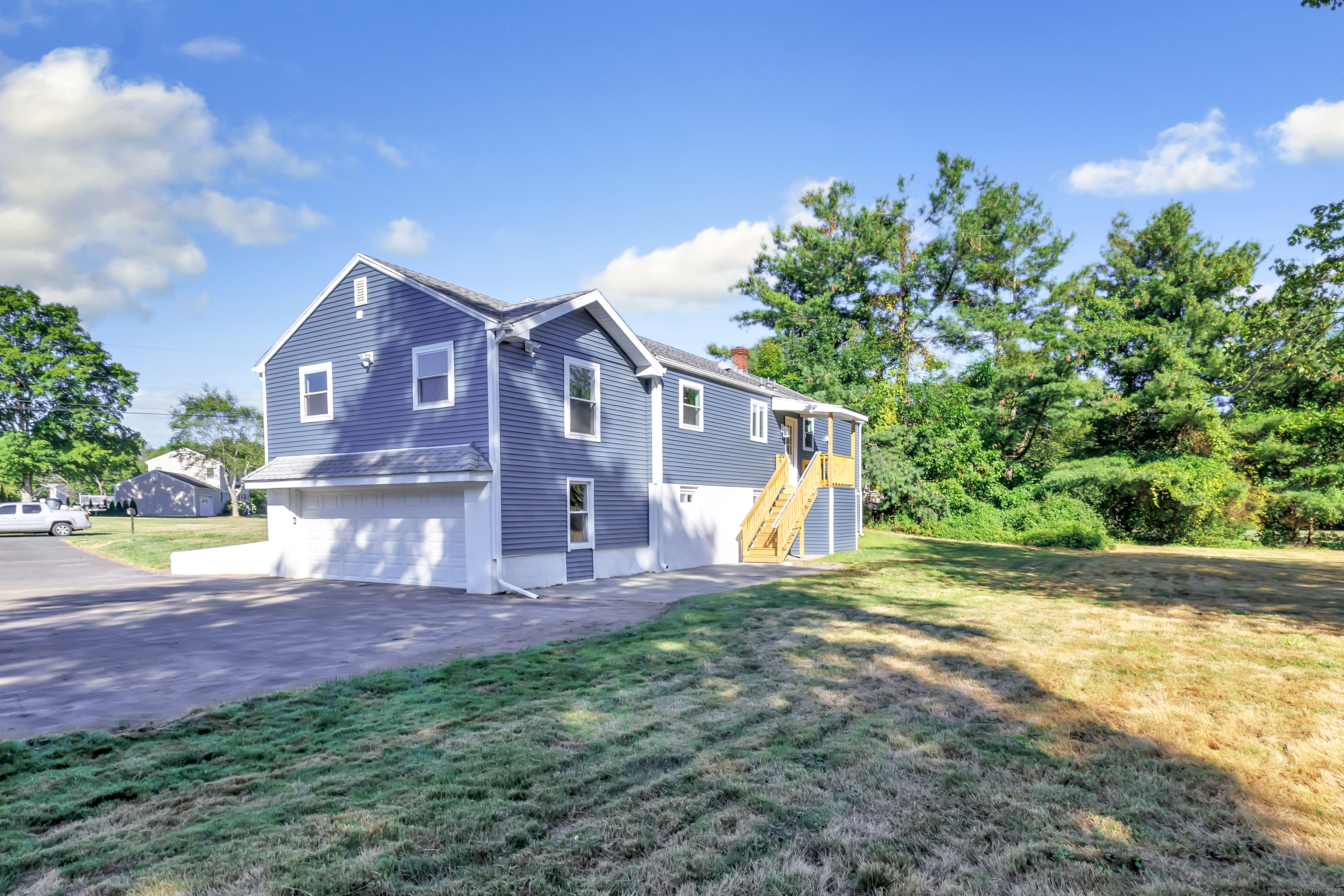 38 Pine River Road North Haven, CT 06473 - Photo 4 of 38 a view of a house with a yard