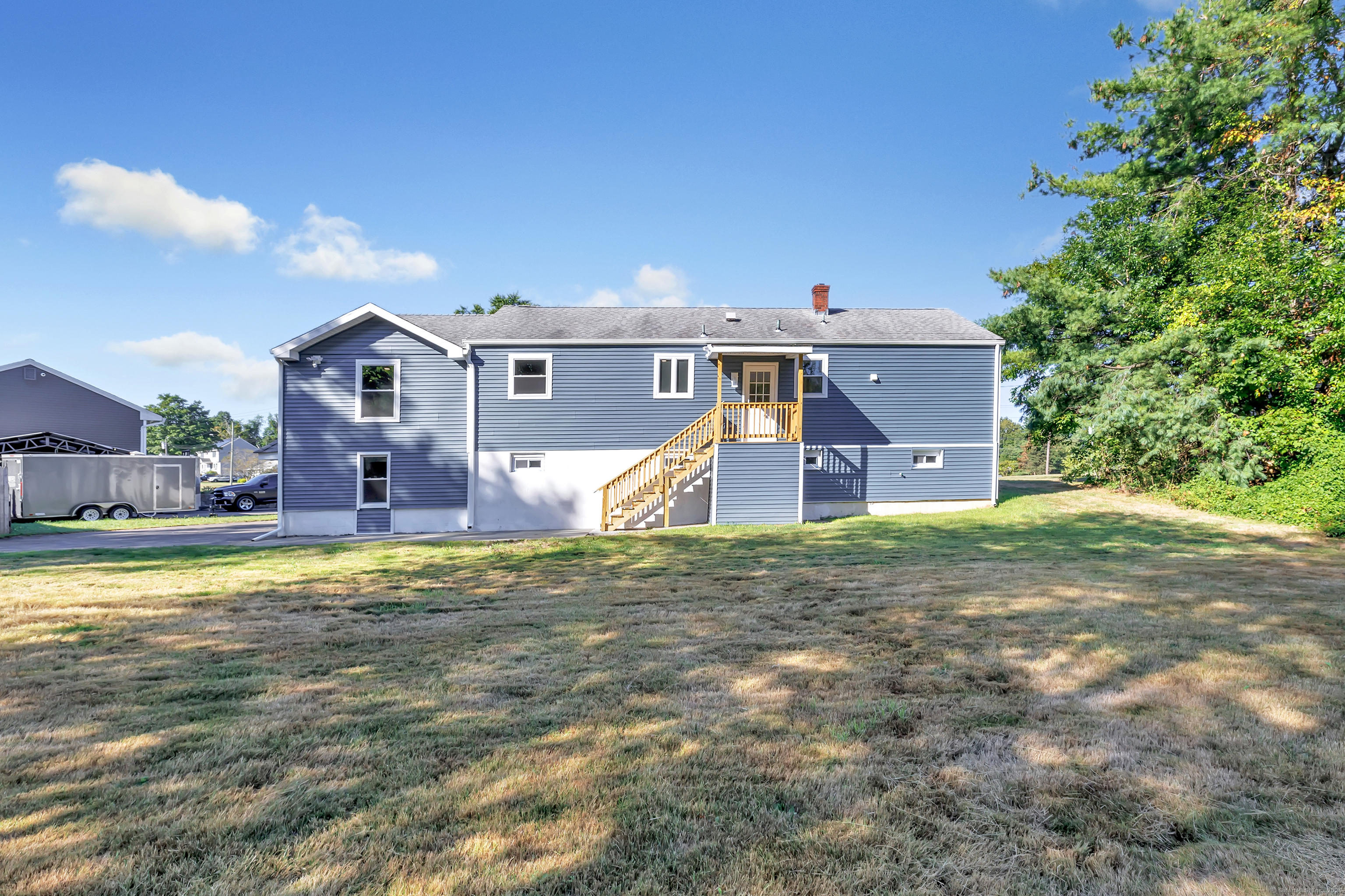 38 Pine River Road North Haven, CT 06473 - Photo 5 of 38 a front view of a house with a yard