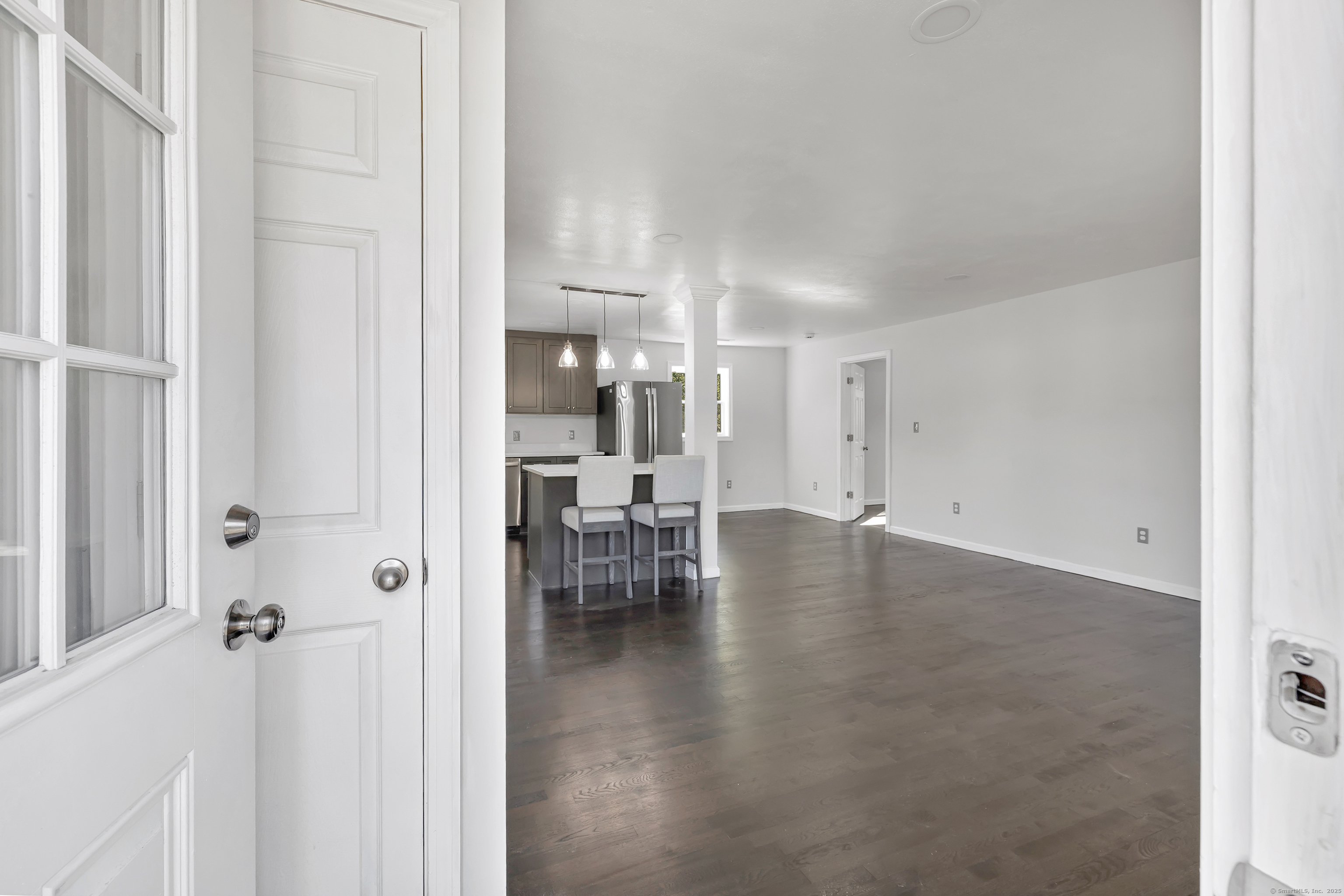 38 Pine River Road North Haven, CT 06473 - Photo 9 of 38 a view of empty room with wooden floor and furniture