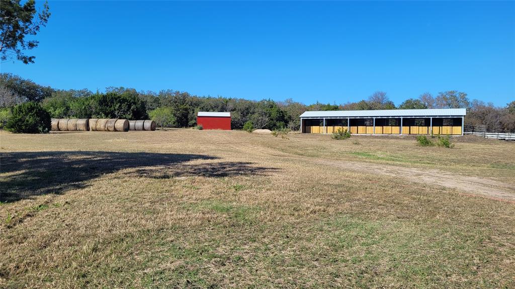 3164 Clater Powell Road Waco, TX 76705 - Photo 12 of 40 a view of a house with a yard