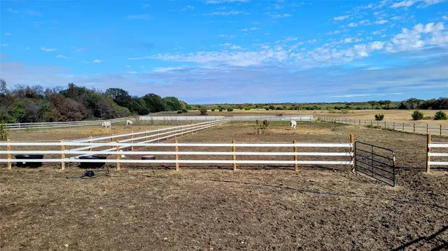 a view of an outdoor space and deck in the back