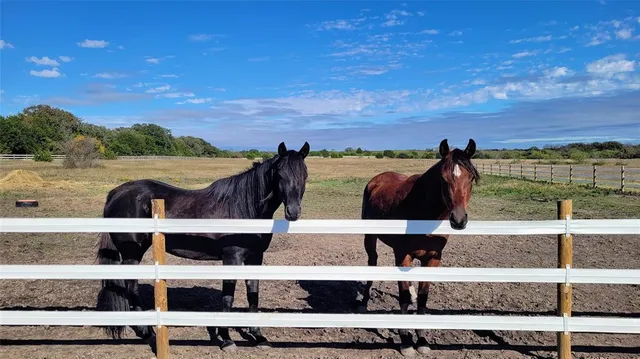 a view of balcony and porch with seating space
