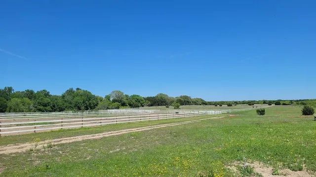 a view of a lake and a yard