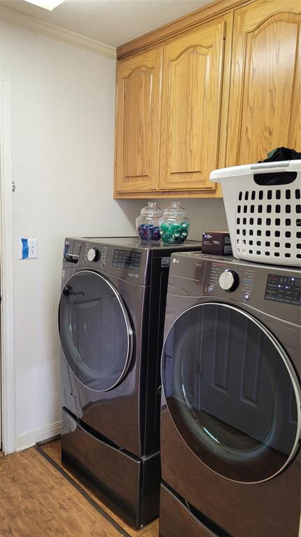 3164 Clater Powell Road Waco, TX 76705 - Photo 23 of 40 a bathroom with a sink a washer and dryer