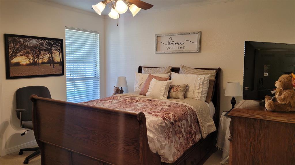 3164 Clater Powell Road Waco, TX 76705 - Photo 28 of 40 a bedroom with furniture and a window