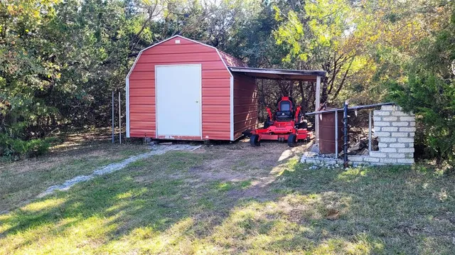 a view of an ocean and yard